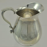 3 Mid-Century Modern Reed and Barton Silver Plate Pitchers